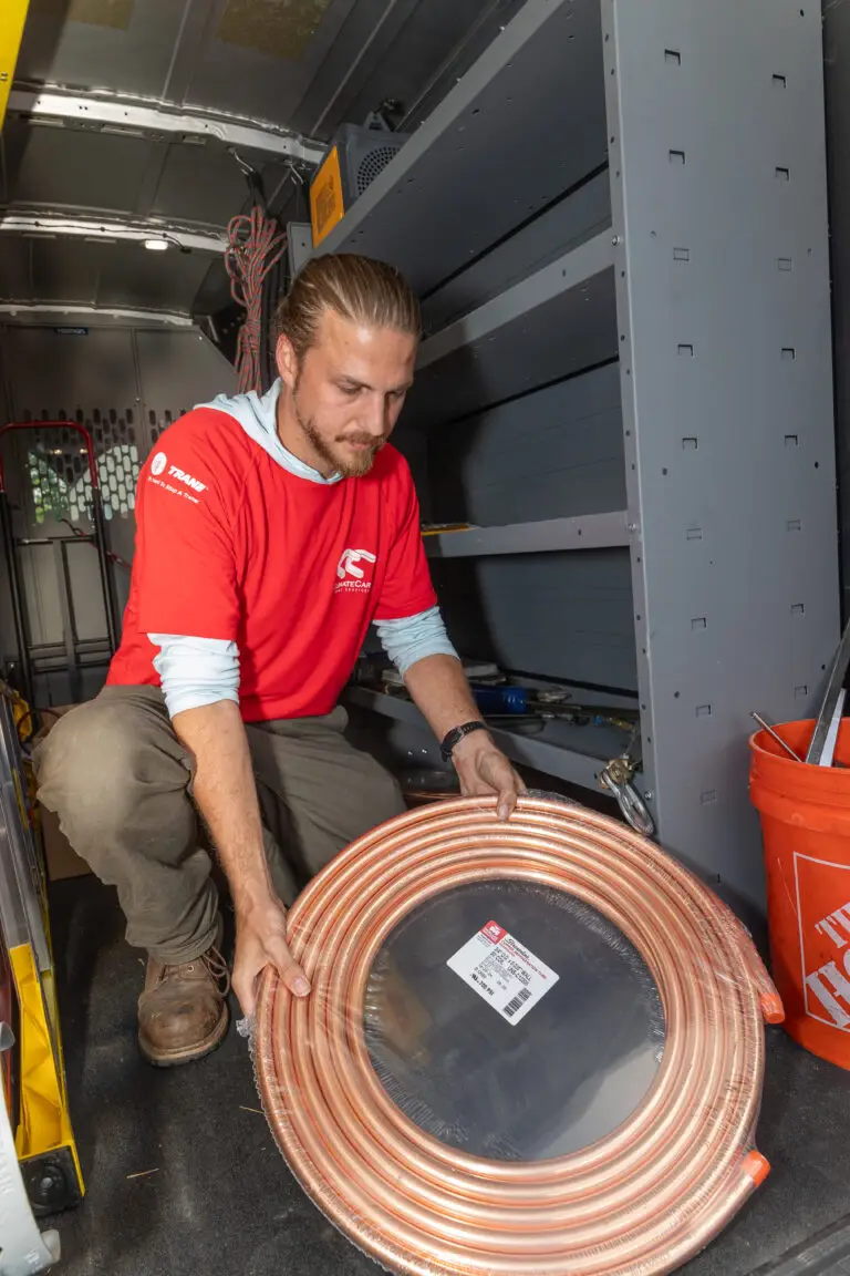 ClimateCare tech unloading a van